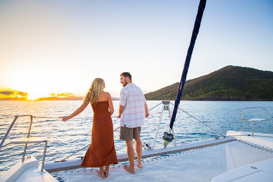Couple Romantic Trip Whitsundays couple on a sailing trip in the whitsundays at sunrise