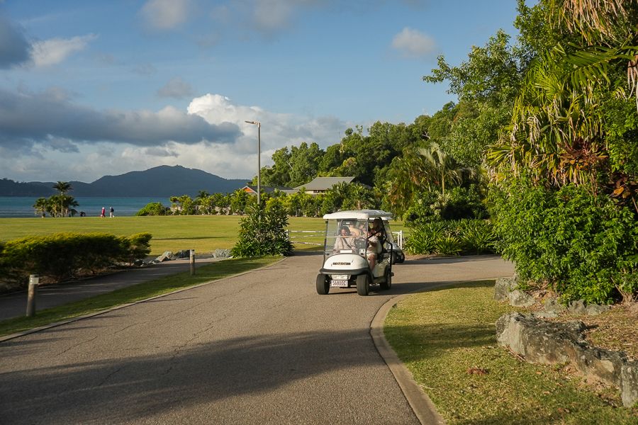 golf buggy riding around hamilton island