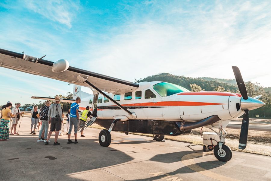 People getting into a plane, Proserpine, Australia