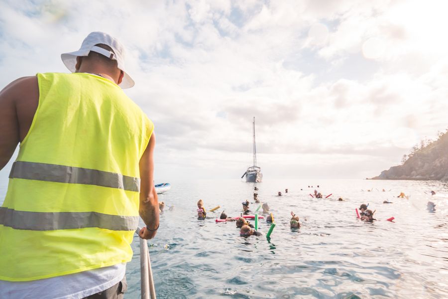 People snorkelling, Whitsundays, Australia