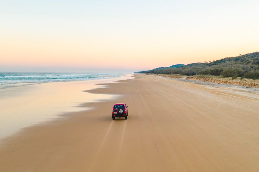 Driving on 75 Mile Beach at Sunset, Fraser Island