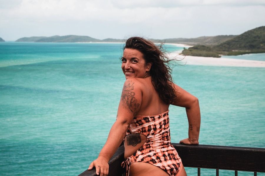Woman standing at Hill Inlet Lookout on Whitsunday Island