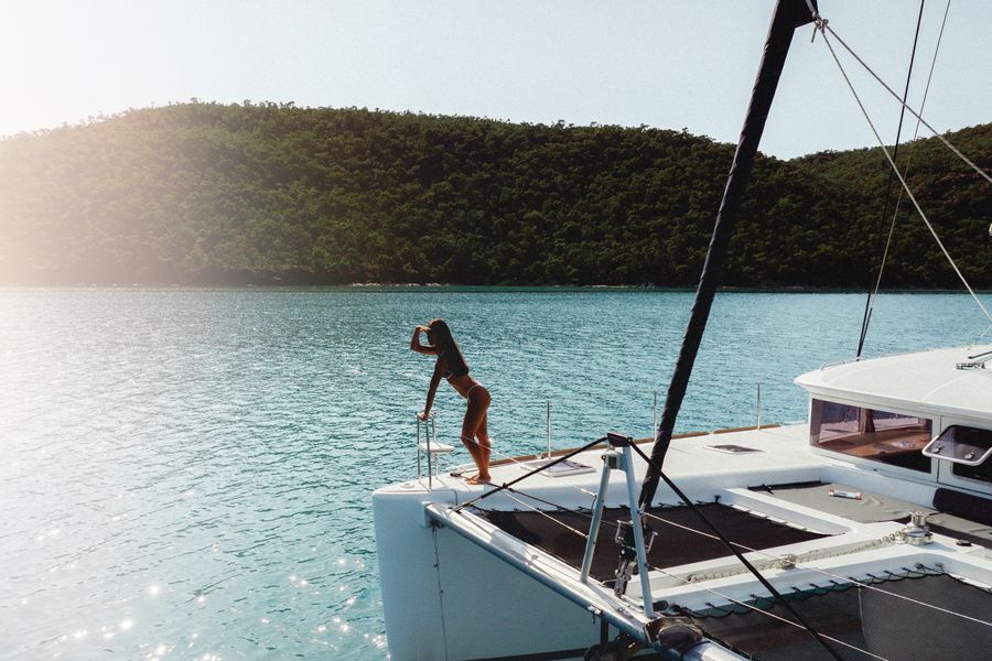 A woman posing on board Whitsunday Pearl in the Whitsnudays