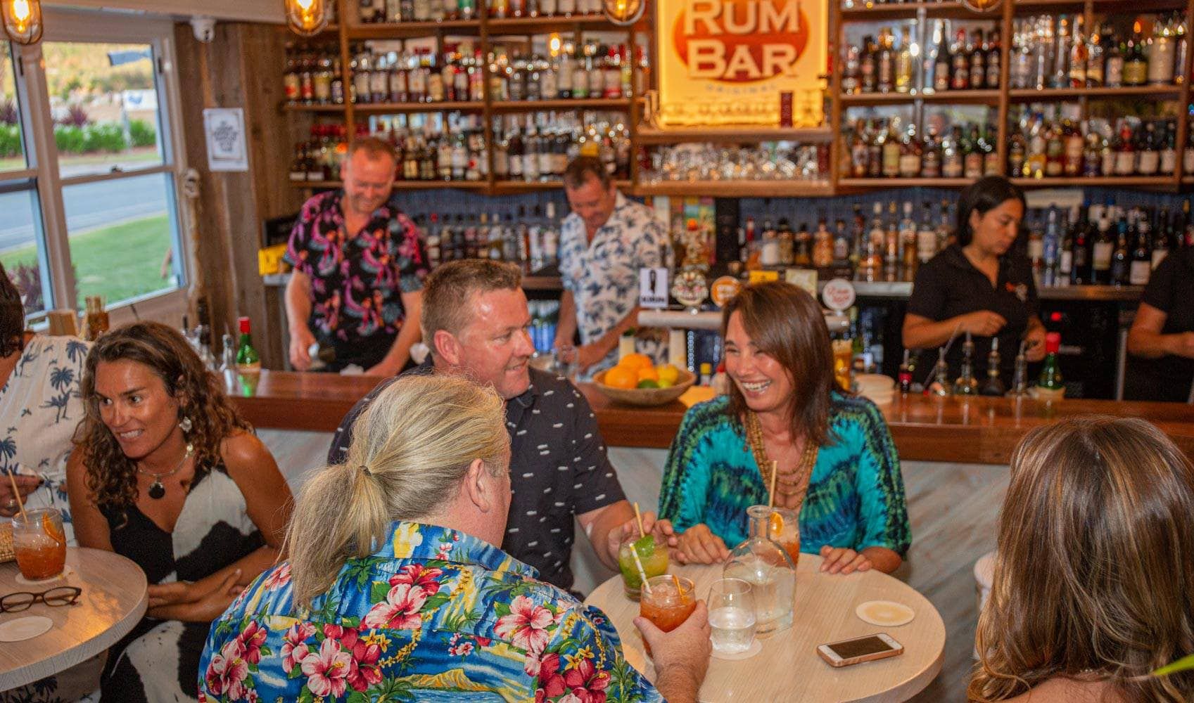 People dining and drinking at Fish Divine and Rum Bar