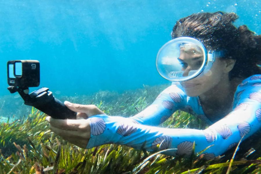 Women taking photos on a GoPro 9, Whitsundays