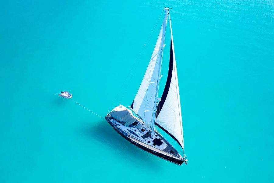 tender being pulled behind milady sailboat