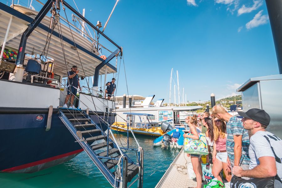 People boarding Atlantic Clipper overnight tour, Whitsundays