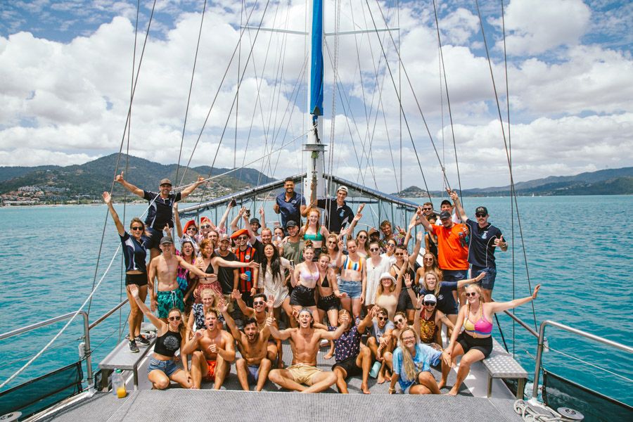 Atlantic Clipper overnight tour crew smile for a photo