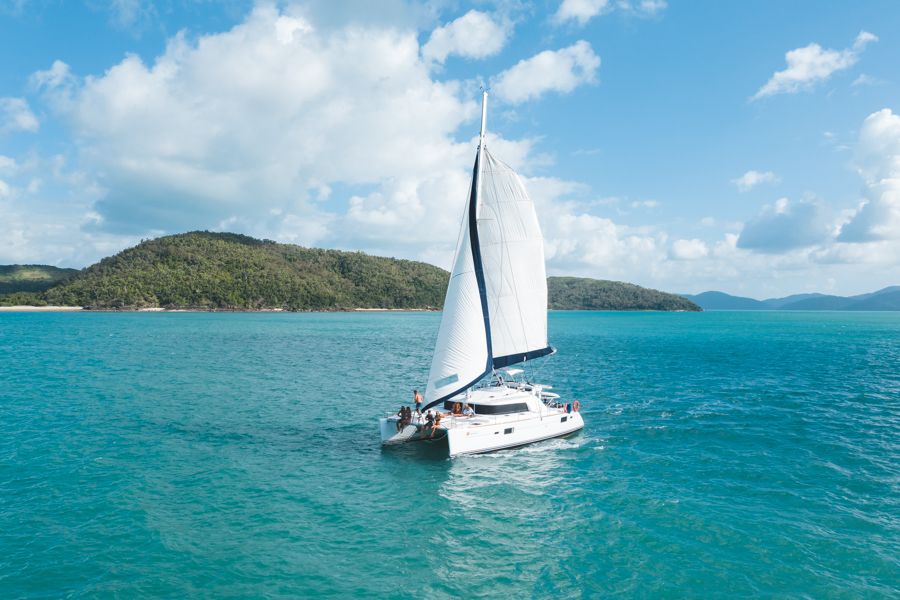 Getaway catamaran sailing through the Whitsunday Islands