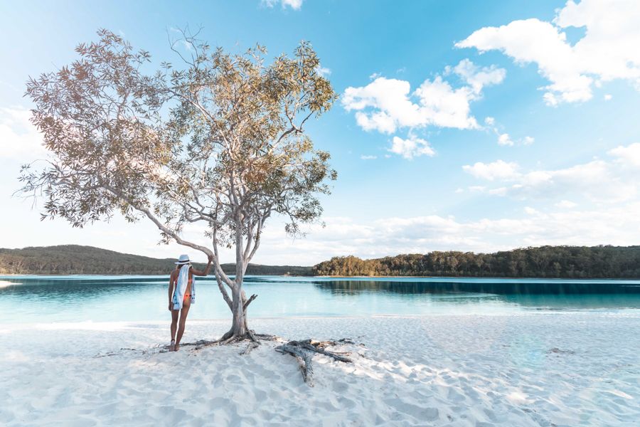 Person about to go for a swim at Lake Mckenzie, Fraser Island