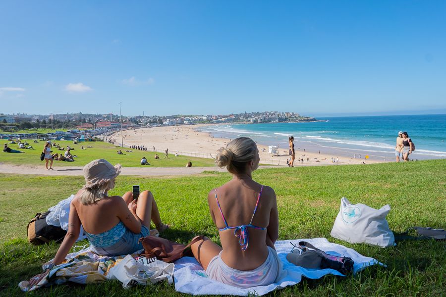 feet relaxing on the grass near the Beach, Sydney Beaches