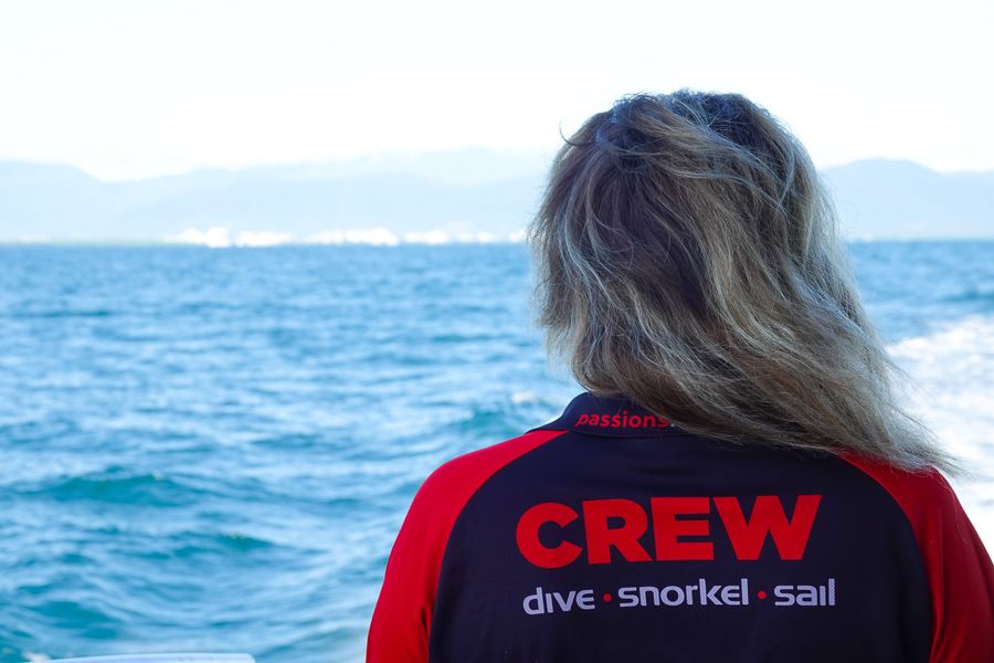 Passions of Paradise crew member on the Great Barrier Reef