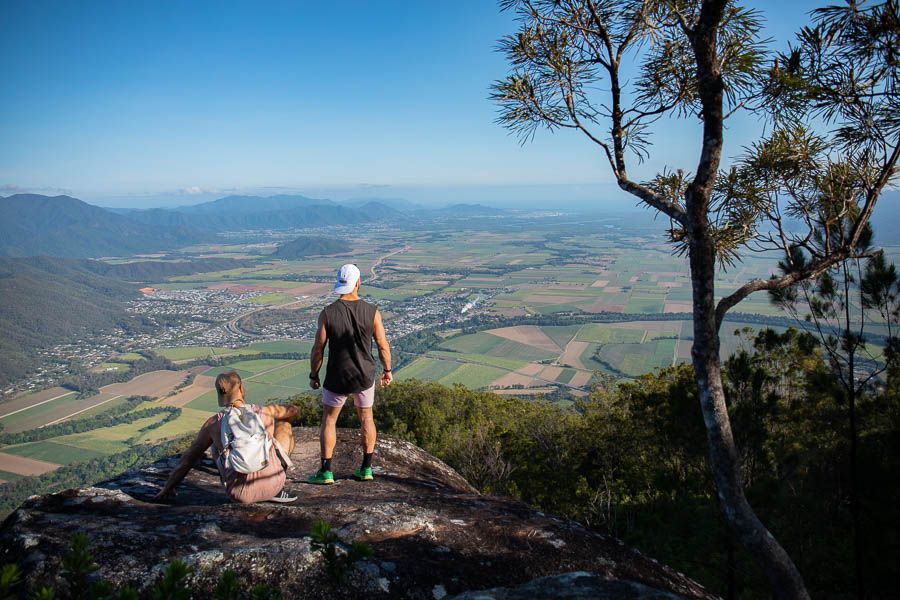 two men standing a top of Cairns Walshs Pyramid 