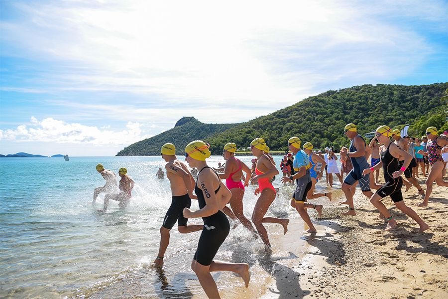 Group of people competing in the Hamilton Island Ocean Swim