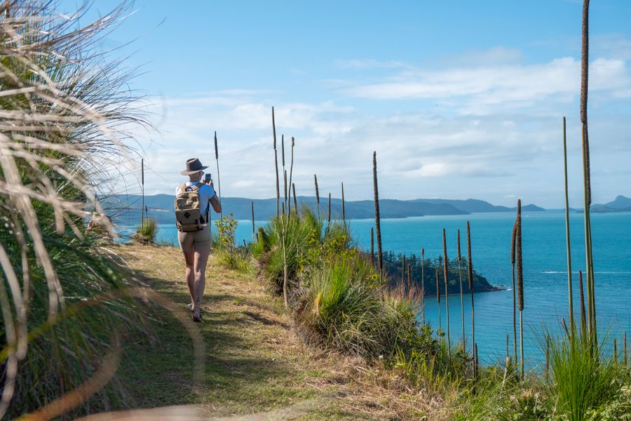 Woman walking amongst the Whitsunday Islands national park