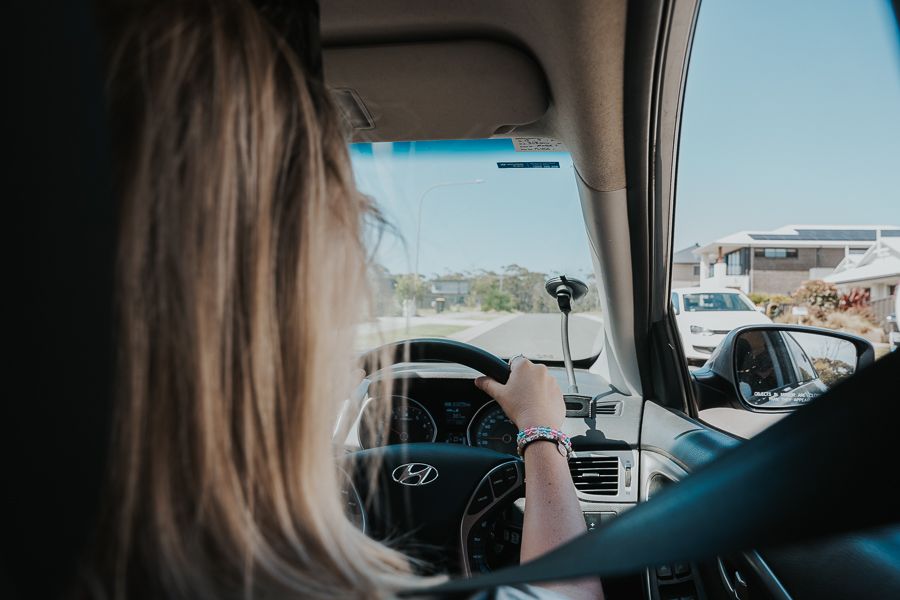 Australian road trip A girl driving in Australia