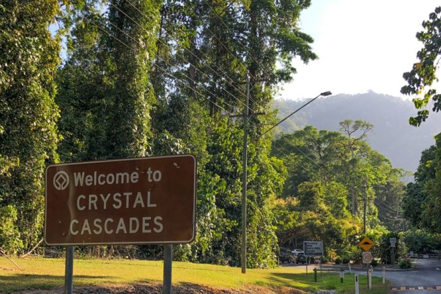 Crystal Cascades road sign, road, lush green surrounds