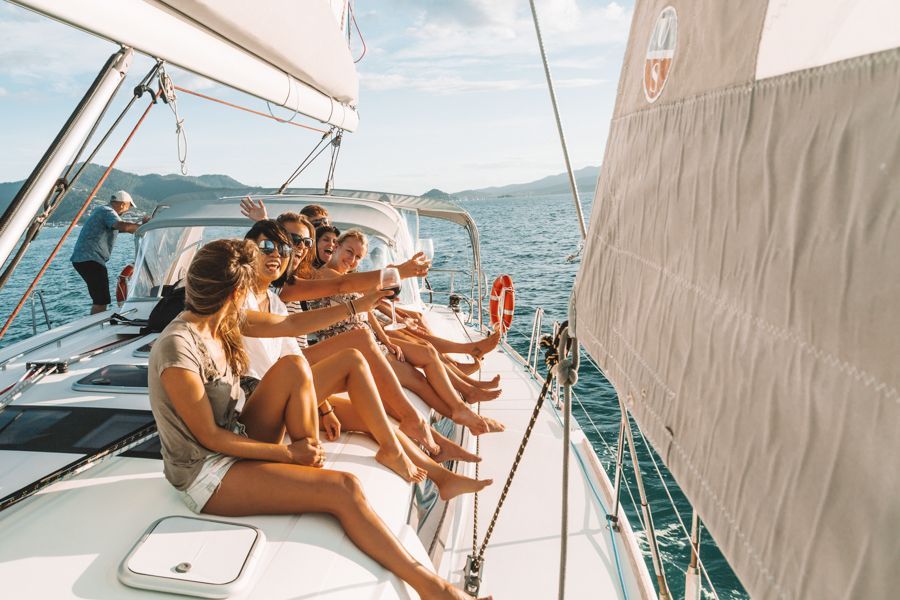 Group of people drinking on a yacht in the Whitsundays