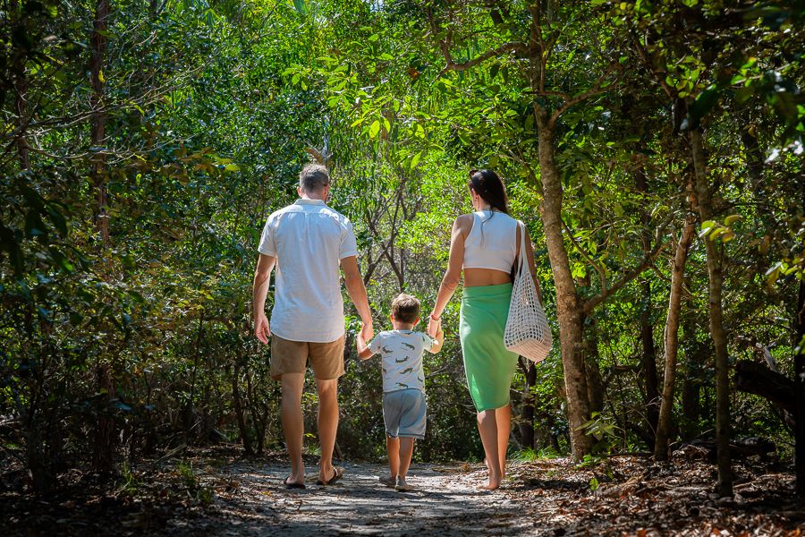 A family walking up to Hill Inlet Lookout