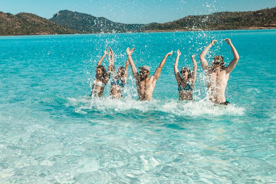 people splashing in the water