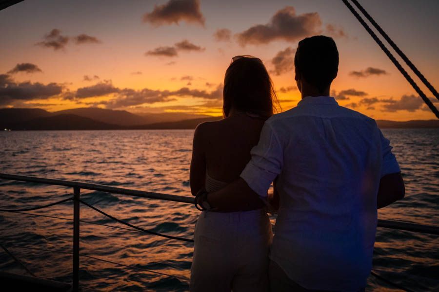 Couple on a boat at sunset