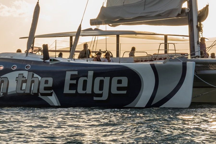 On the Edge catamaran in the Whitsundays at sunset