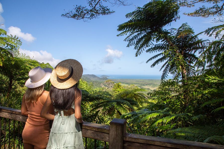 two girls posing at alexandra lookout in the daintree rainforest