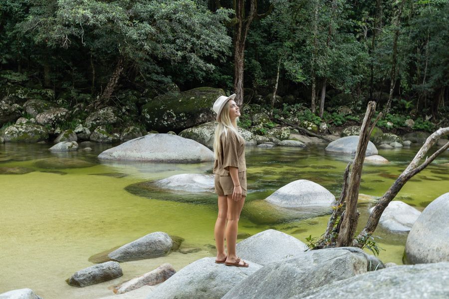 girl standing on the rocks near mossman gorge