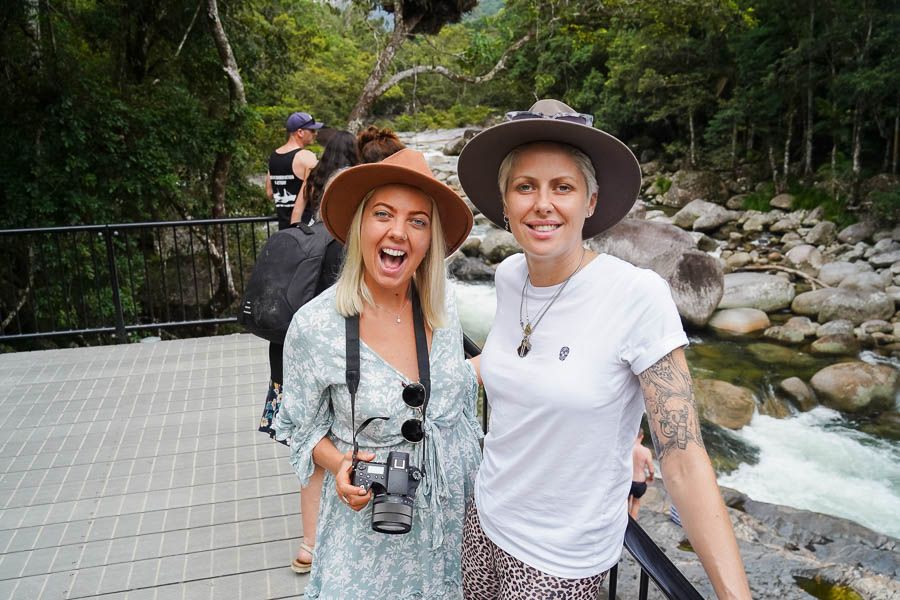 people posing at mossman gorge in the daintree rainforest