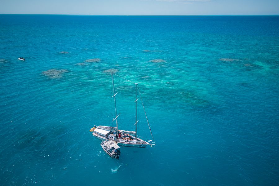 aerial view of reef and boat