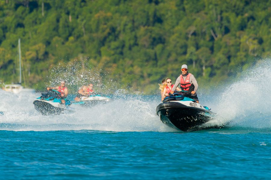 Jetski Tour a jetski tour out on the water making big splashes
