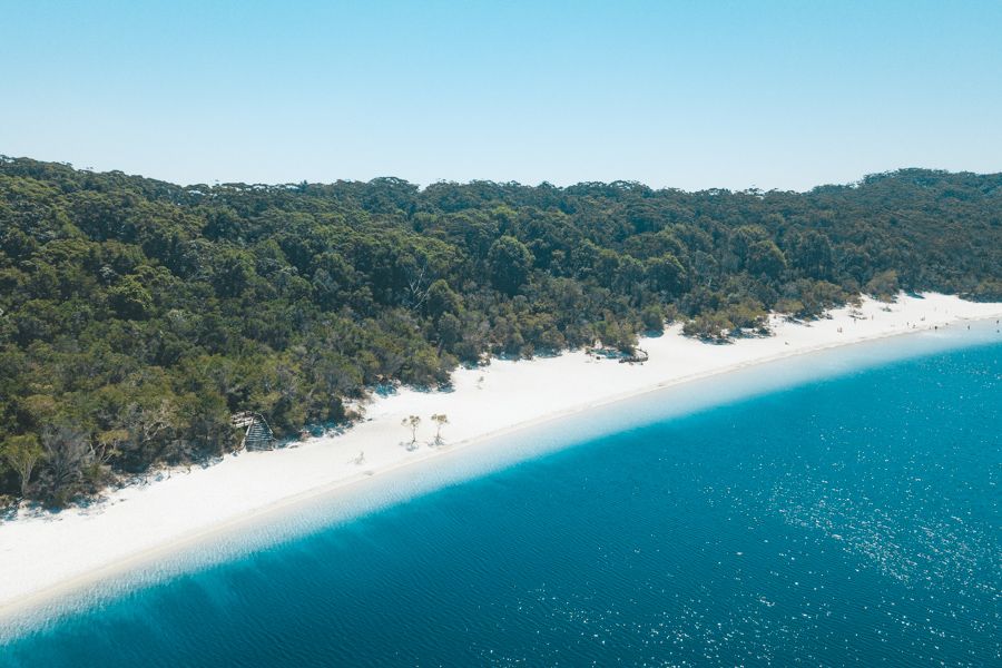 aerial view of Lake McKenzie with white sand and blue water