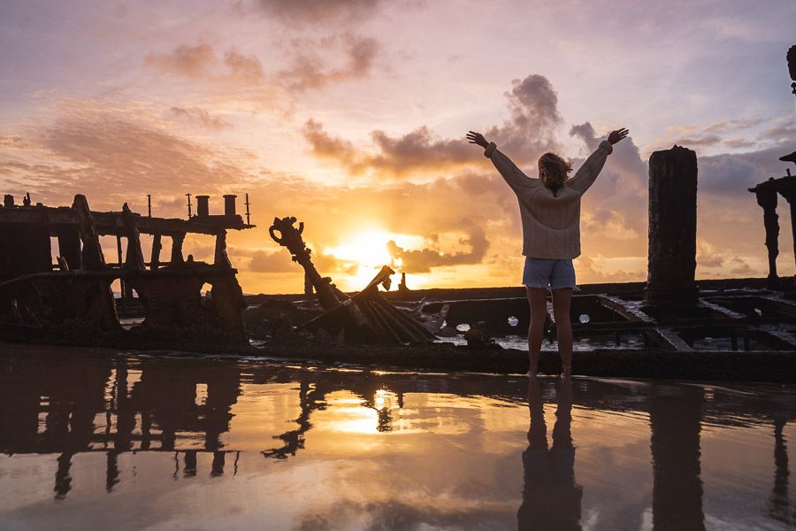 person posing at sunrise