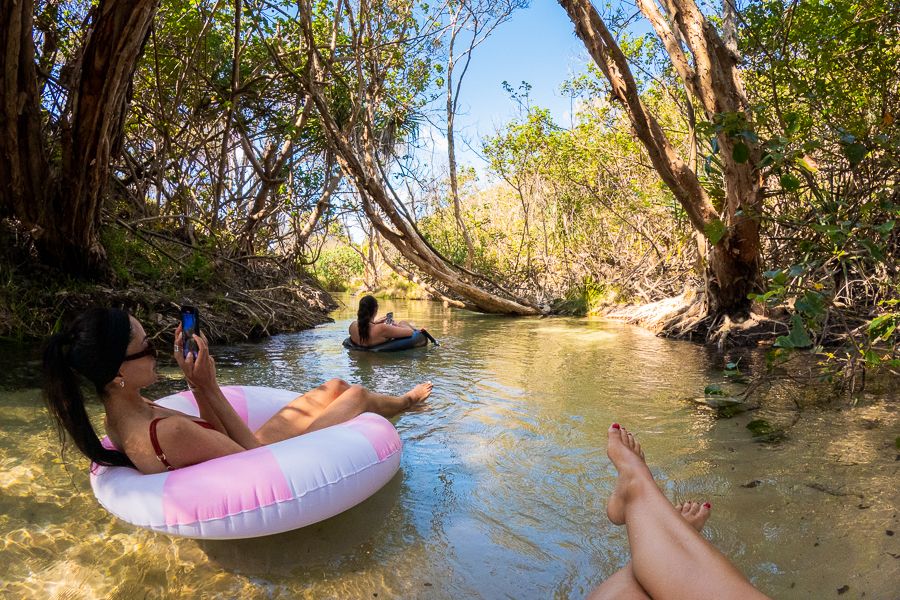 girls floating in tubes down eli creek kgari