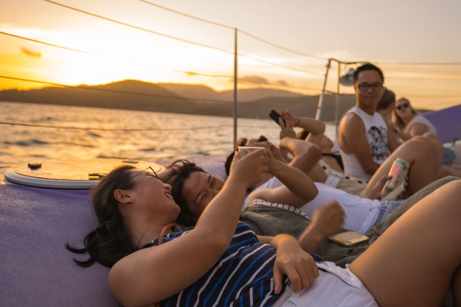 people on a sunset boat cruise