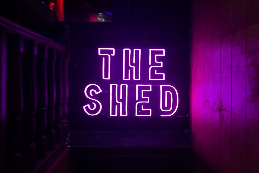 The Shed sign in neon