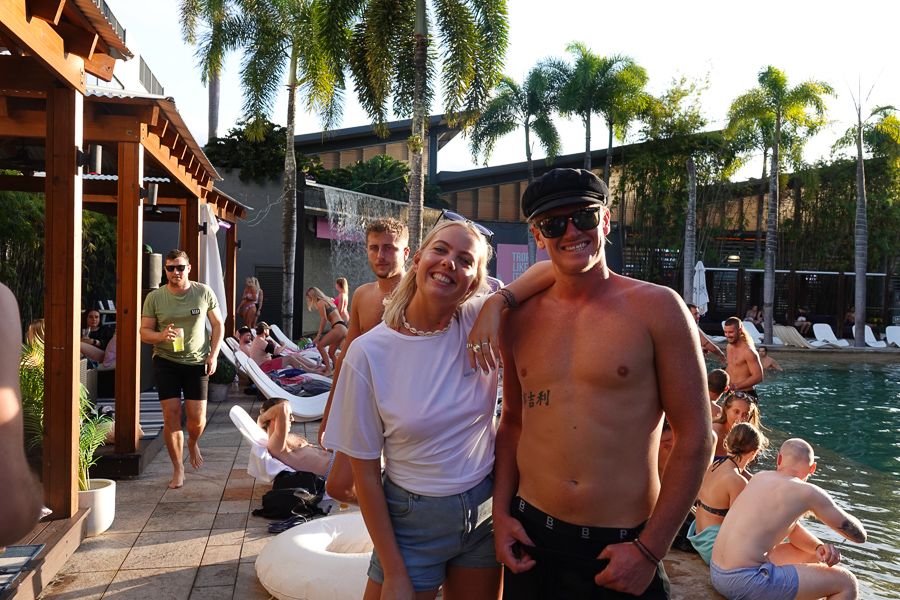 Man and woman loving life at hostel