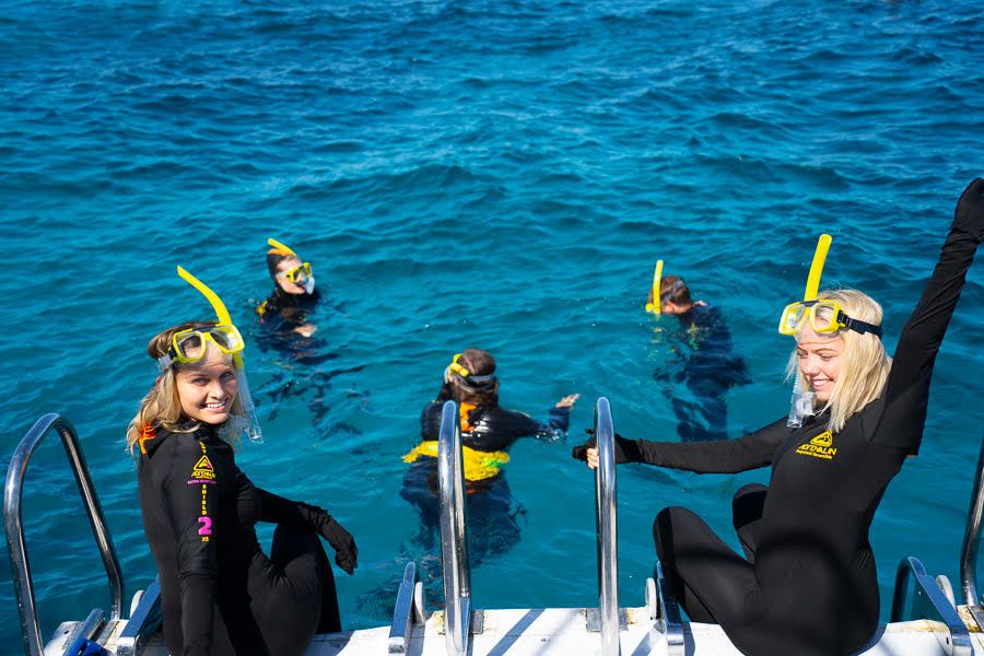 Girls getting ready for a scuba adventure 