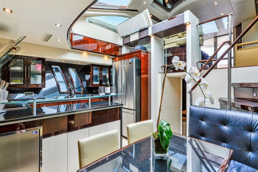 The galley inside of a superyacht with fine and classy furnishings