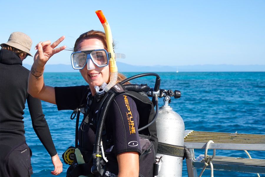A girl about to go snorkelling in the Great Barrier Reef