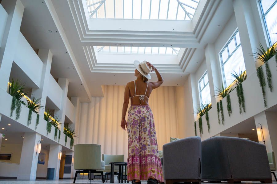 girl in a nice dress exploring a Hamilton Island hotel