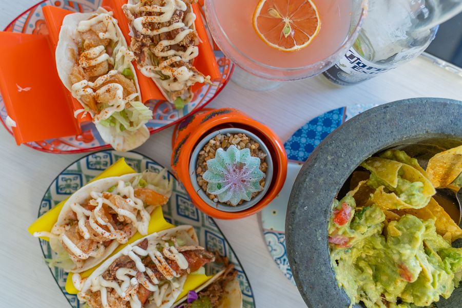 Food spread with drinks and seafood at a restaurant