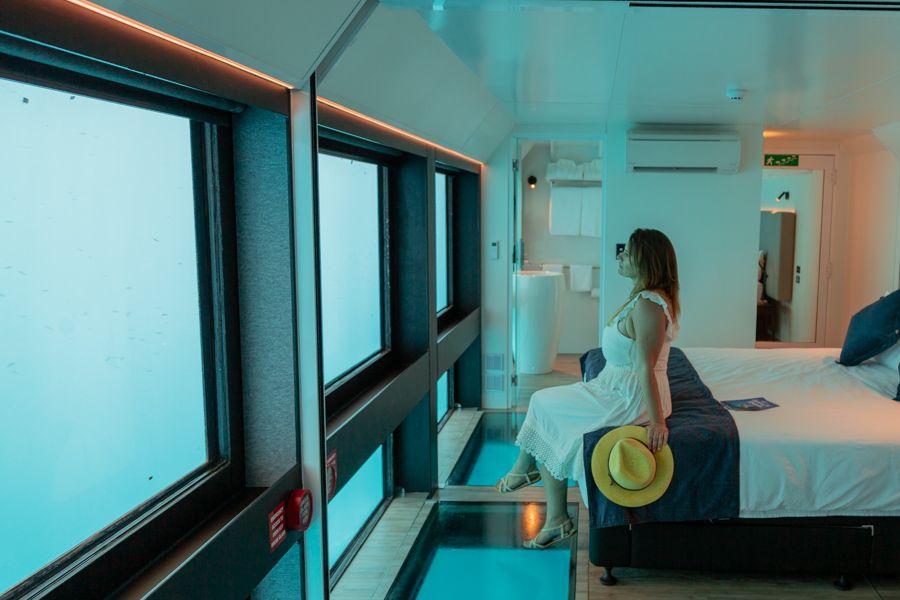 People admiring the great barrier reef views at Reefsuites