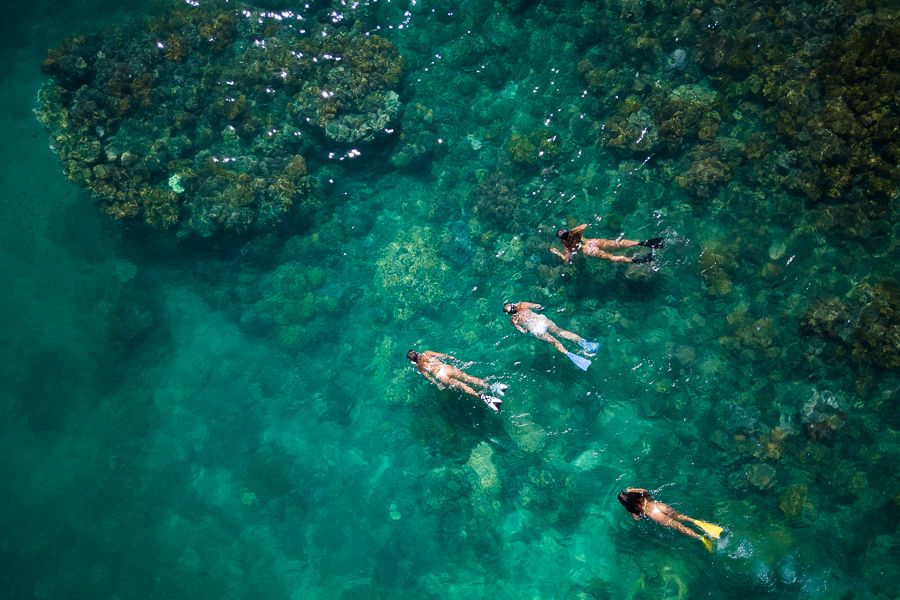 girls snorkelling great barrier reef coral reefs