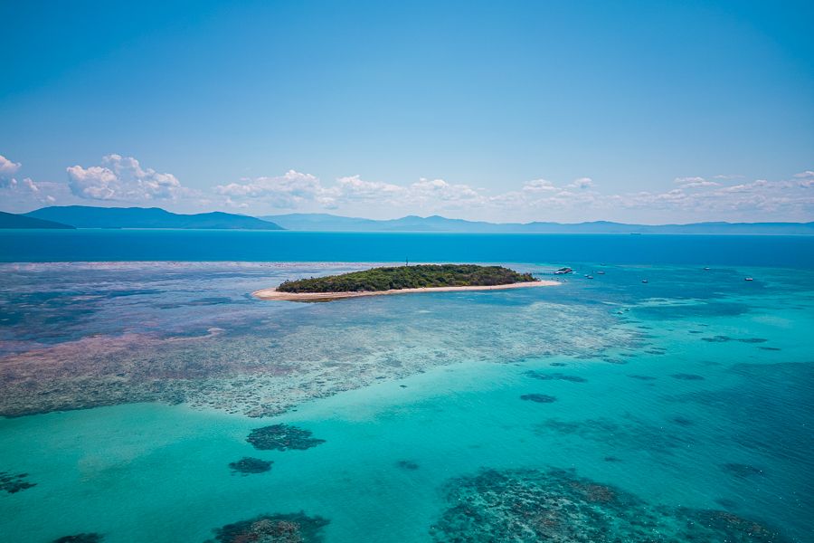 Aerial views of green island and the surrounding reef