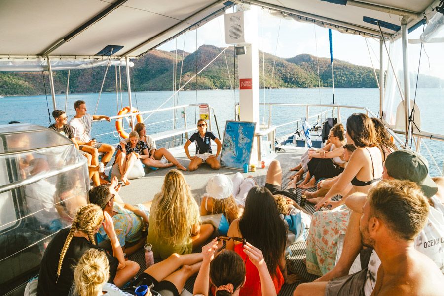 group gathered on a boat