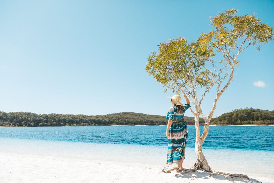 girl standing near tree at Lake McKenzie