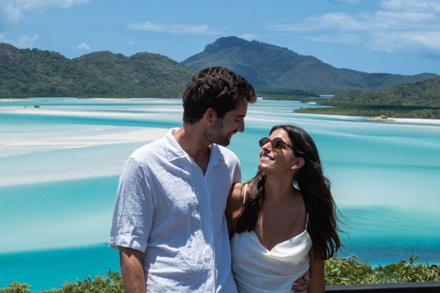 couple smiling at hill inlet lookout whitsundays