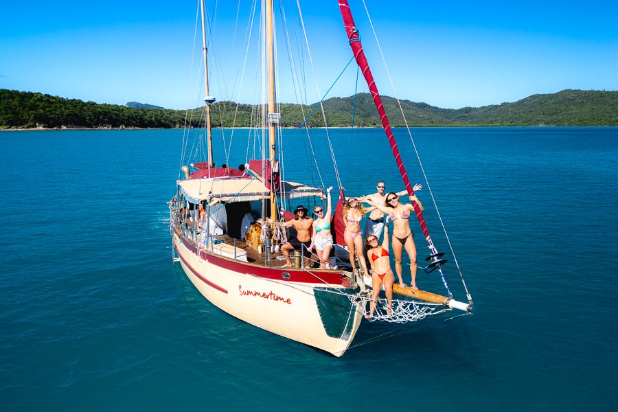A drone shot of a sailing boat