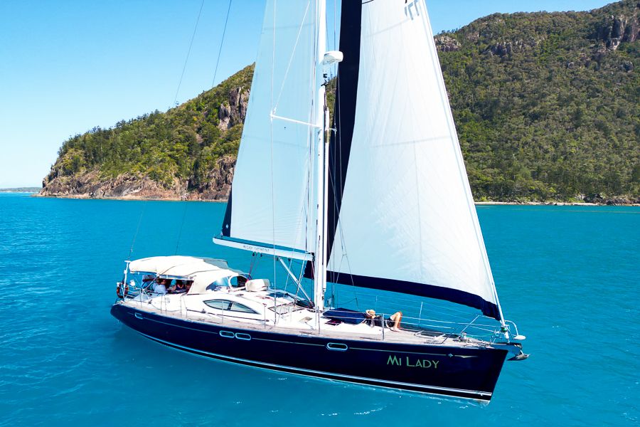 A sailing boat cruising through the ocean